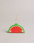 WMELON-Gifts-The WMELON set includes a faux leather watermelon keyring and vibrant card holder, perfect for adding a pop of colour to your everyday essentials. The keyring is shaped like a watermelon slice while the card holder features a sleek and simple design.The shell of this product is made with 52% recycled polyurethane. Using recycled polyurethane helps divert plastic waste from ending in landfills and helps us to reduce our dependency on virgin materials. Keyring and card holder set Watermelon desig